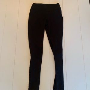black leggings with grid mesh on calf